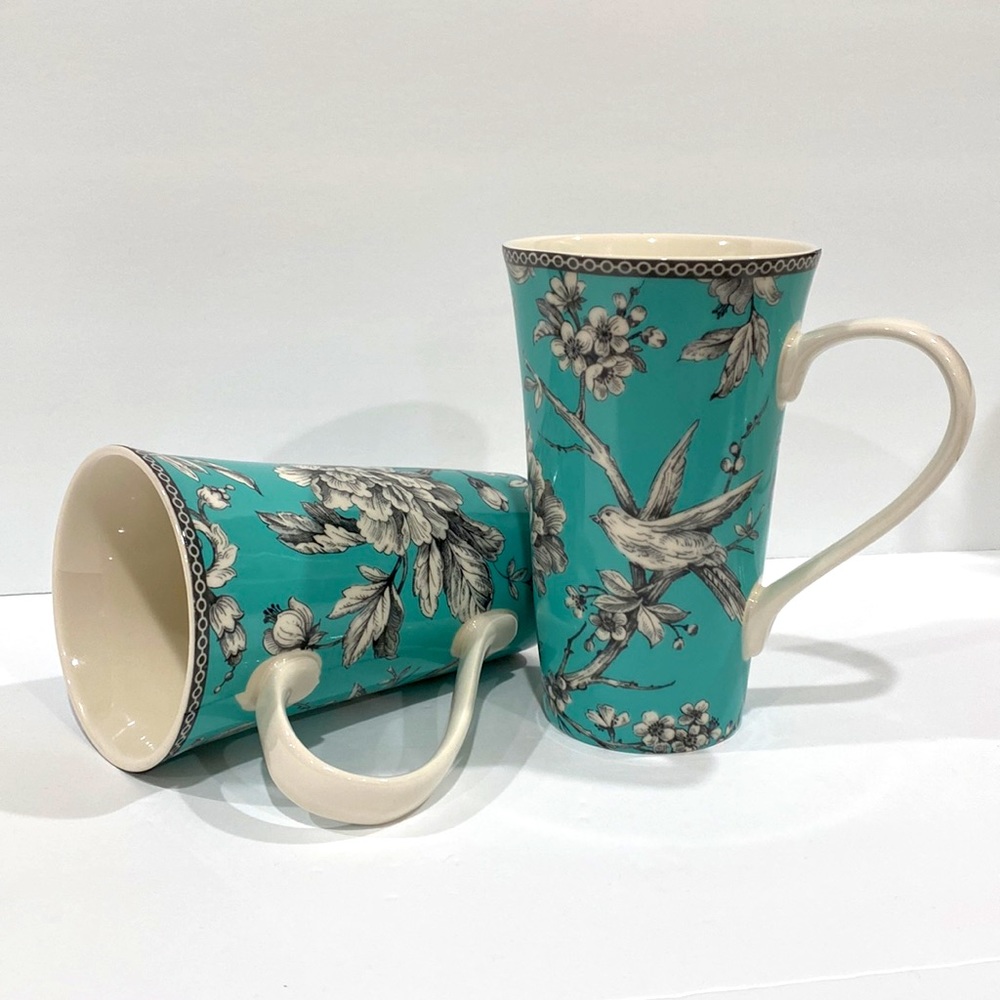 Set of fine porcelain turquoise coffee drink glasses. Floral print bird print.